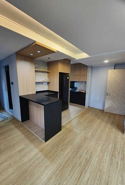renovation Home renovation service in Singapore showcasing flooring and carpentry.